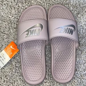 Brand new purple Nike slides.